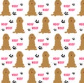 A seamless pattern with brown spaniel dogs and footsteps Royalty Free Stock Photo